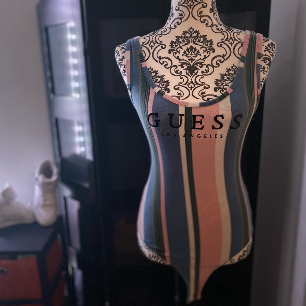 Guess bodysuit for sale size S. Very versatile, stretchy, sturdy material.